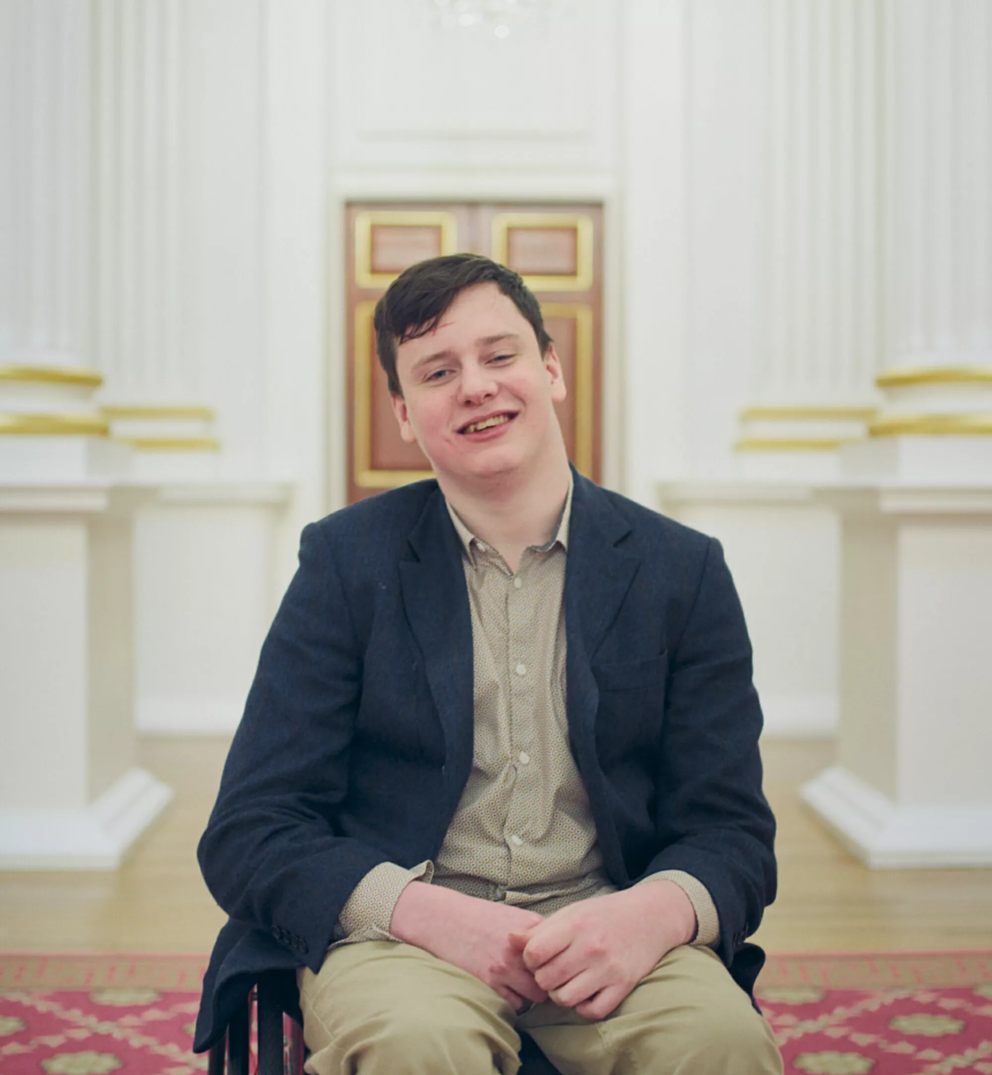 Image of Henry, a Snowdon Trust grant student, smiling at the camera