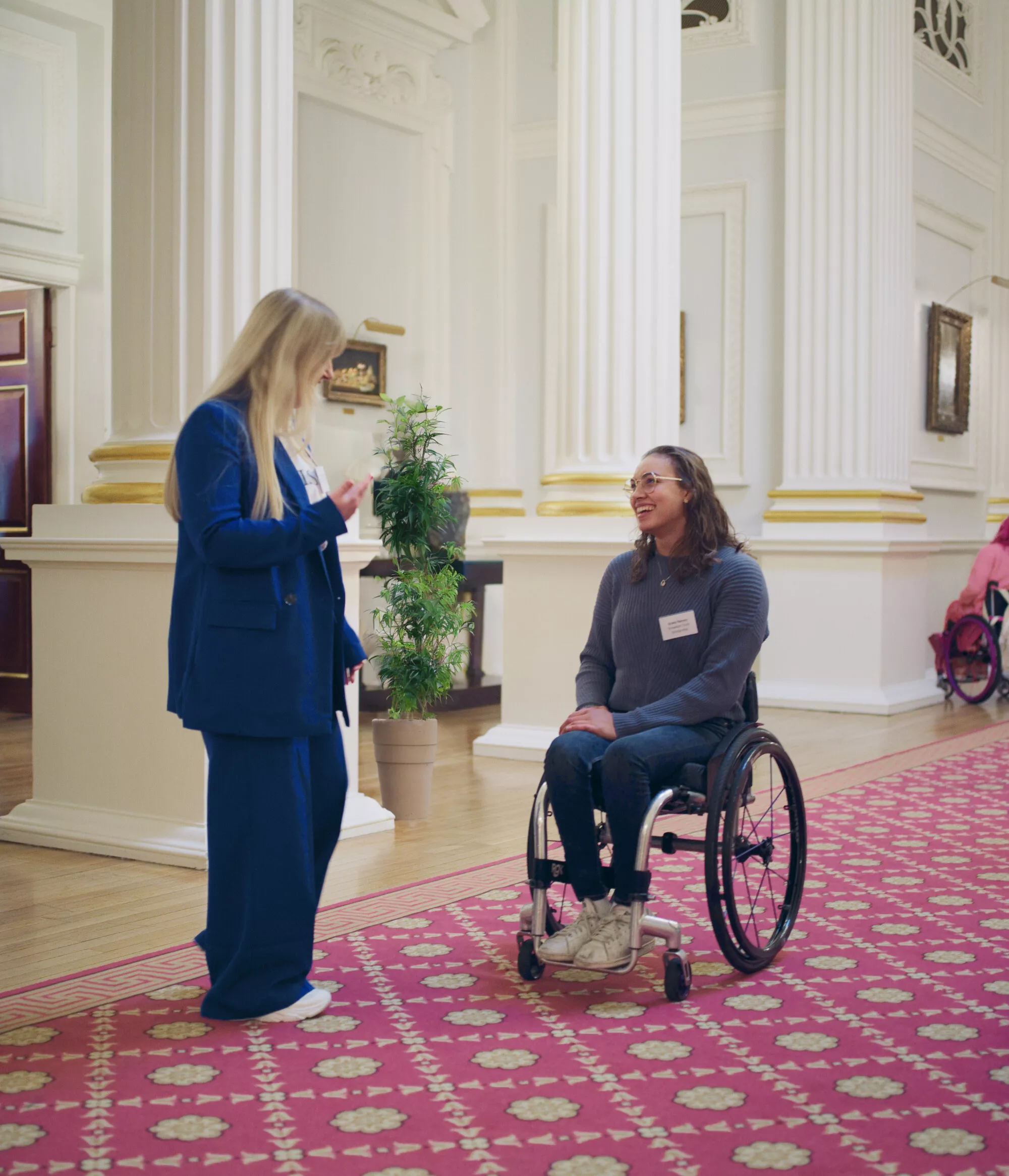 Image of Ali and Grace, two Snowdon Trust Scholarship recipients, in conversation together