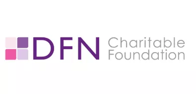 Logo of the DFN Charitable Foundation. It is a square divided into 4 cubes in shades of pink and purple
